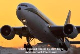 Alitalia B777-243/ER EI-DDH lifting off near sunset at Miami International Airport aviation stock photo #3268