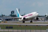 2012 - Caribbean Airlines B737-8Q8 9Y-BGI taking off on runway 13 at FLL aviation stock photo #1727