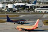 Southwest Airlines B737-7H4 N763SW, Air Jamaica A320 and JetBlue A320 aviation stock photo #7799