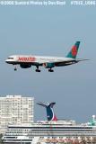 America West (US Airways) B757-2S7 N903AW over Carnival cruise liner at Port Everglades aviation airline stock photo #7915