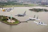 Heritage Flight of P-51 Mustang, F-16 Fighting Falcon, F-15 Eagle and A-10 Thunderbolt II over the Statue of Liberty