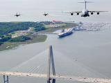 USAF F-15 Eagles and C-17 Globemaster III over the USS Yorktown and USCG Cutter at Charleston