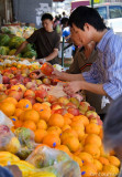 Man Buying Apple