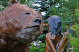Bear and young Indian sculpture in Frisco, Colorado