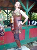 Wilma looks enticing and fearsome at the same time in her armour