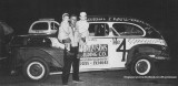 1954 - Joe Bocskey holding sons Lawry (left)  and Terry (right) at the stock car races