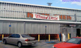 2009 - Winn-Dixie under renovation with the old Kwik Chek sign underneath the facade