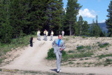 Justin arriving at the wedding site, groomsmen in the background (2659)