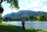 2010 - Karen next to Cheyenne Lake at the Broadmoor Hotel with Cheyenne Mountain in the background