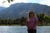 2010 - Karen next to Cheyenne Lake at the Broadmoor Hotel with Cheyenne Mountain in the background