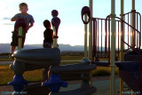 August 2010 - Kyler and another young lad on the playground at Peterson AFB at sunset