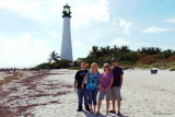 November - Jonathan Perez, Donna, Lisa Marie Criswell Law and Creed Law in front of the Cape Florida lighthouse