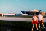 1976 - Dan and Denise Griffis at Miami International Airport with the National Airlines Maintenance Base in the background