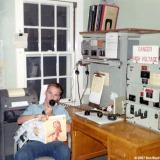 1967 - Don standing radio, telephone and teletype watch at Coast Guard Station Lake Worth Inlet, Peanut Island