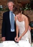 Jim and Kathy cutting wedding cake, photo #7276