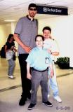 1999 - Tallest NBA player Gheorge Muresan, Dave Kaufman and Kev Cook at JFK