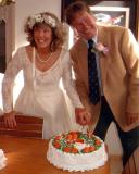 Brenda and Dennis and their wedding cake