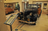 1939 Pontiac Woody station wagon, photographed through glass window