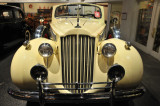 1939 Packard Super Eight Phaeton by Derham; originally had dark color; painted yellow during 1970s restoration