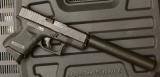 Glock model 26, 9mm with AWC Titanium Suppressor