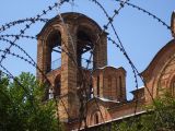serbian orthodox church protected with barbed wire