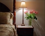 Roses on her bedside table