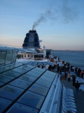 Top Deck of Ship During Sailaway -- Notice Everyone is Bundled Up!