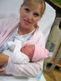 KELLY HOLDING NEWBORN ANNIE