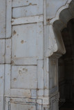 Bullet-damage to the tomb