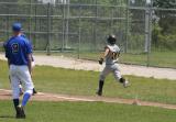cody hustles down the first base line