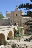 Bridge over moat and gate of Mdina