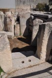 Tarxien Temples - holes to allow passage of liquid offerings 