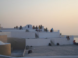 People Admiring Santorini Sunset (2).jpg
