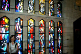 Nazareth: Judy in front of the stained glass windows in the upper church of the Basilica of the Annunciation