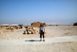 Judy on top of Masada with the Dead Sea and mountains of Jordan in the background.
