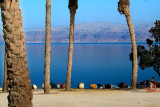 The public beach at the Dead Sea in Ein Gedi. Mountains in Jordan are in the background.