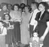 Aunt Rosie reading - 45th anniversary party for grandma Anna and grandpa Louis (mothers side) (1952)