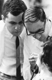 Richard learning a dental technique from an instructor (1967)