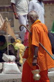 Babu in Orange with Stick