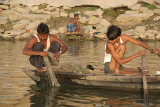 Fishermen Checking Nets