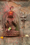 Holy Figure in Wall with Offerings and Trident