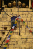 Man Replacing Prayer Flags in Boudha Stupa 02