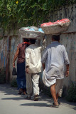 Men with Baskets on Their Heads