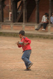 Boy Flying Kite in Durbar Square Bhaktapur