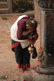 Old Woman Annointing Shrine Bhaktapur