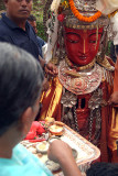 Woman with Offerings and Effigy Pancha Dan