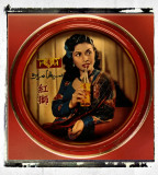 Old tray with advertisement featuring actress Maria Menado