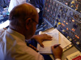 The Flight Engineer writing the Log - 799.JPG