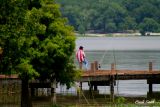 SITTING ON THE DOCK OF THE LAKE....WASTING TIME