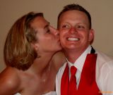 AMANDA KISSING CHAD ON THE CHEEK